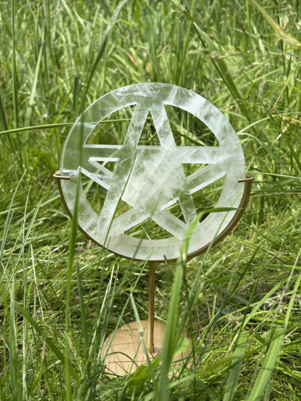 White quartz pentacle on golden stand,15 cm diameter.