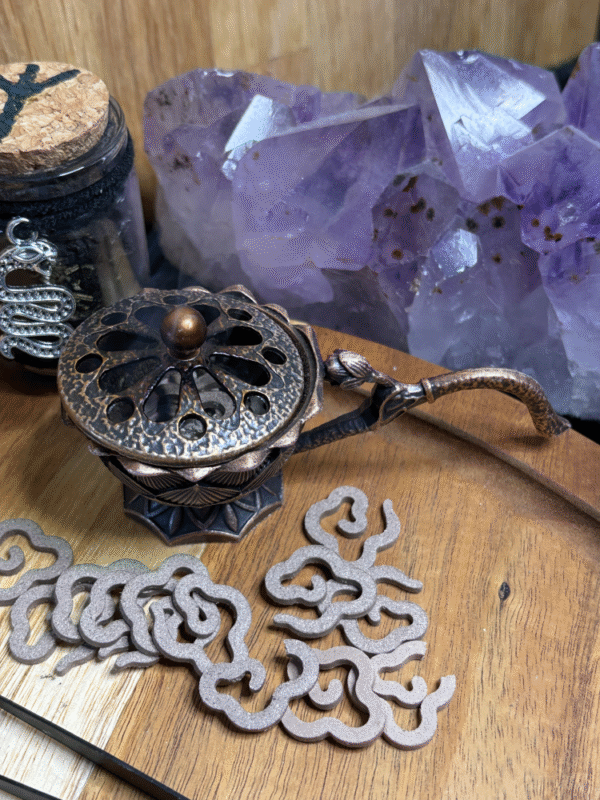 Antique-style bronze incense holder with flower pattern