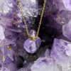 Heart-shaped amethyst crystal bottle necklace with gold chain – calming oil pendant for peace and balance