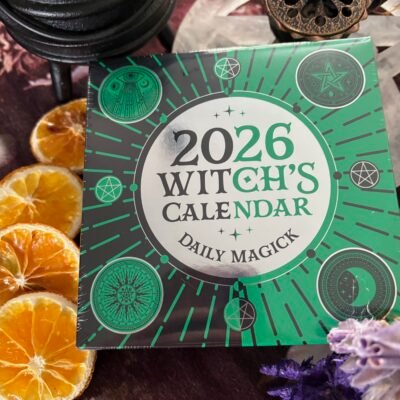 Witch’s 2026 Calendar surrounded by crystals and flowers