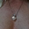 Rose quartz crystal bottle pendant with love oil and silver chain – wearable love talisman