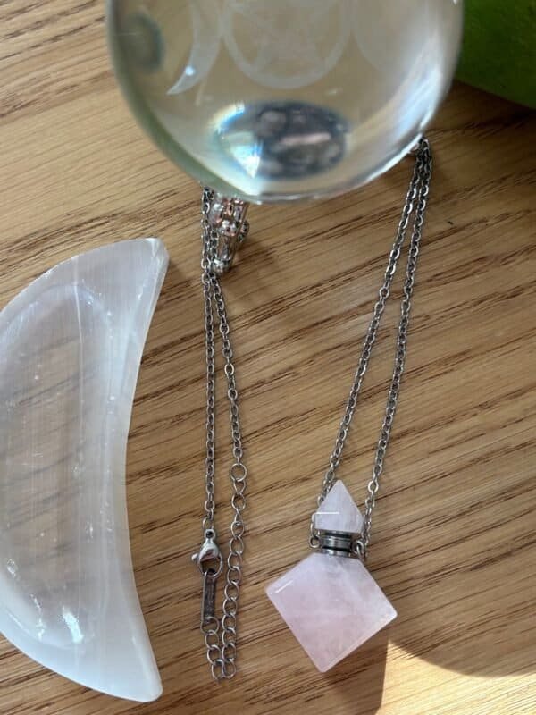Rose quartz crystal bottle pendant with love oil and silver chain – wearable love talisman