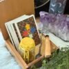 Two hand-carved vintage wooden boxes with mystical designs, perfect for tarot cards, crystals, or as a travel altar. Joy spell jar tarotcard and smudgestick and a spoon with a butterflie