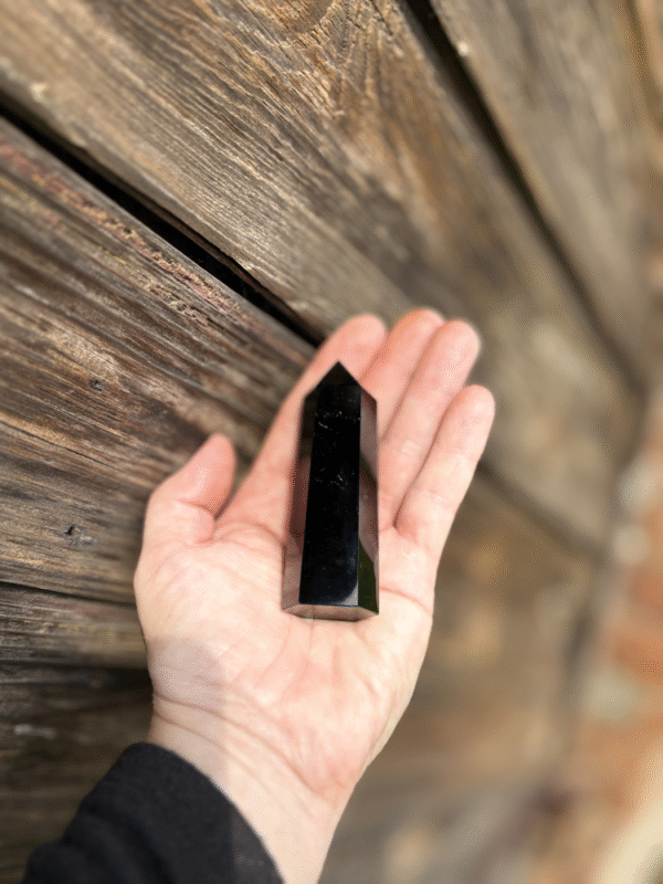 Powerful black Obsidian tower for protection, wealth, and spiritual clarity. Height ~8 cm.