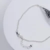 Back view of "Nattuggla" silver bracelet showing chain and clasp detail.