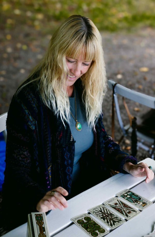 Tarot Reading in Nature – Mistwillow Witch Photography Witch reading tarot cards outdoors in nature, Mistwillow spiritual guidance photography