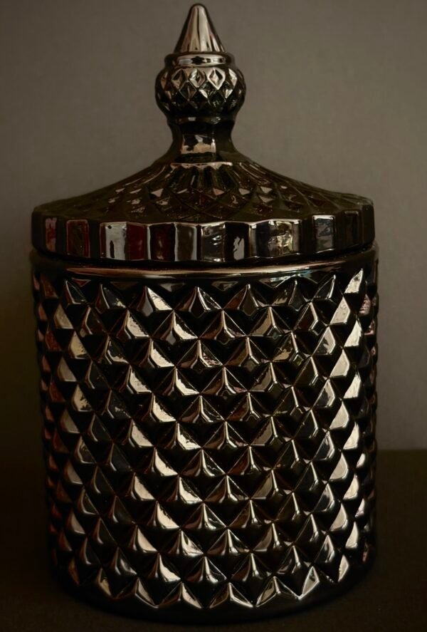 Black grimoire ritual candle in textured glass jar